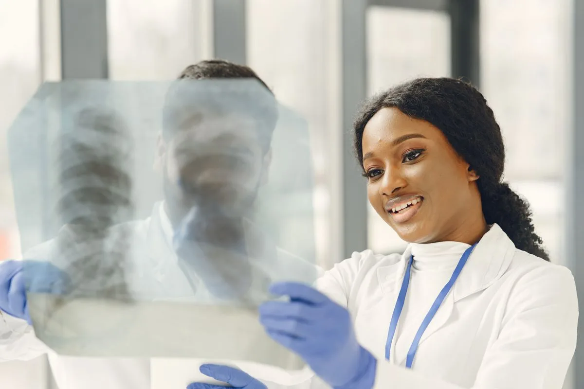 Clinicians reviewing an X-ray together